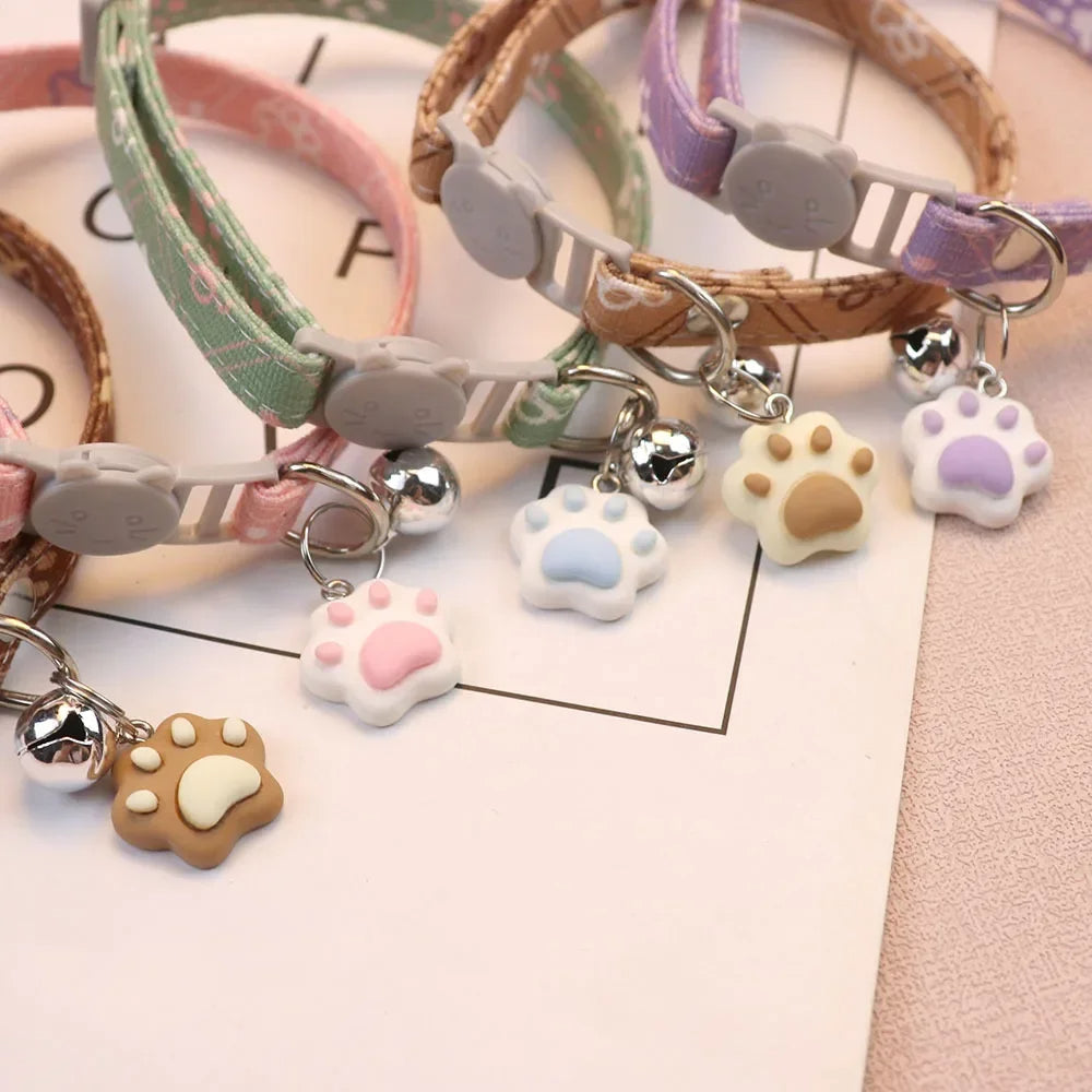 Adjustable footprint print pet collar with bell for cats

Small dog breakaway safety collar with cute design

Cat and kitten collar with bell and adjustable buckle

Puppy footprint collar with quick-release safety feature

Lightweight cute pet collar for dogs and cats